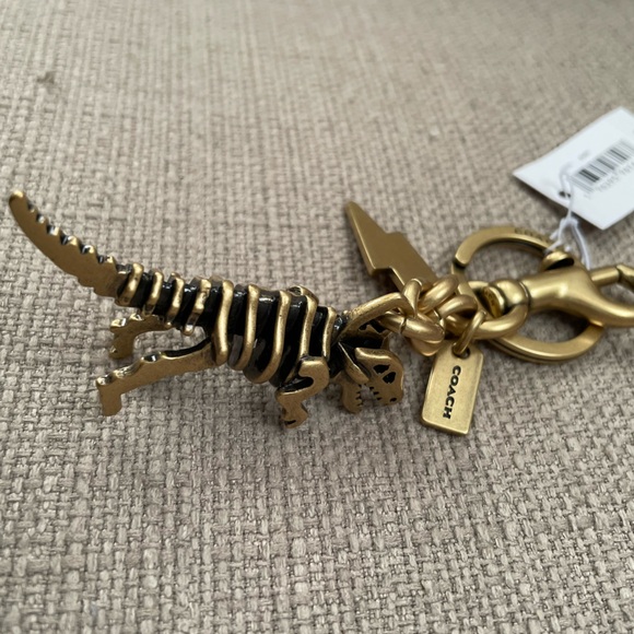 Coach Small Rexy Skeleton Bag Charm in colour brass - Picture 8 of 13